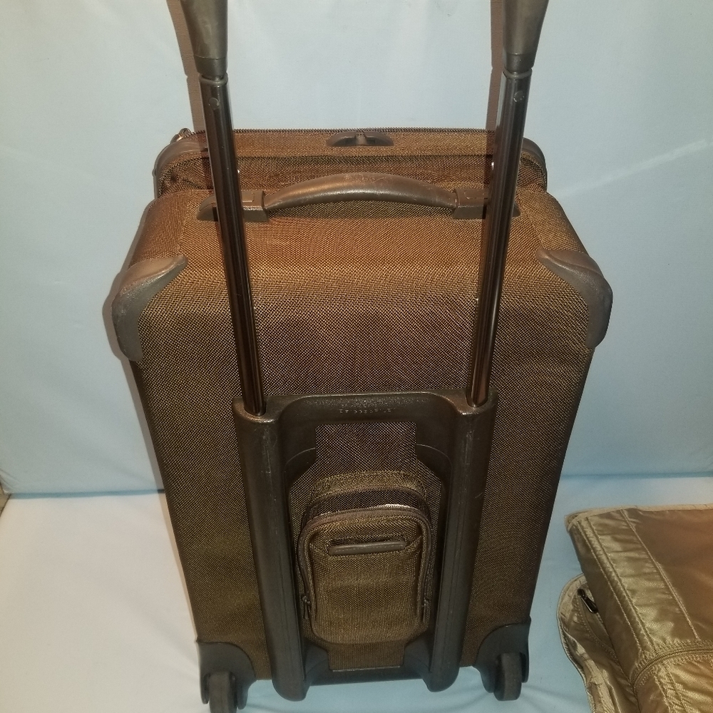 Brown Briggs & Riley carry on suitcase wheeled bag